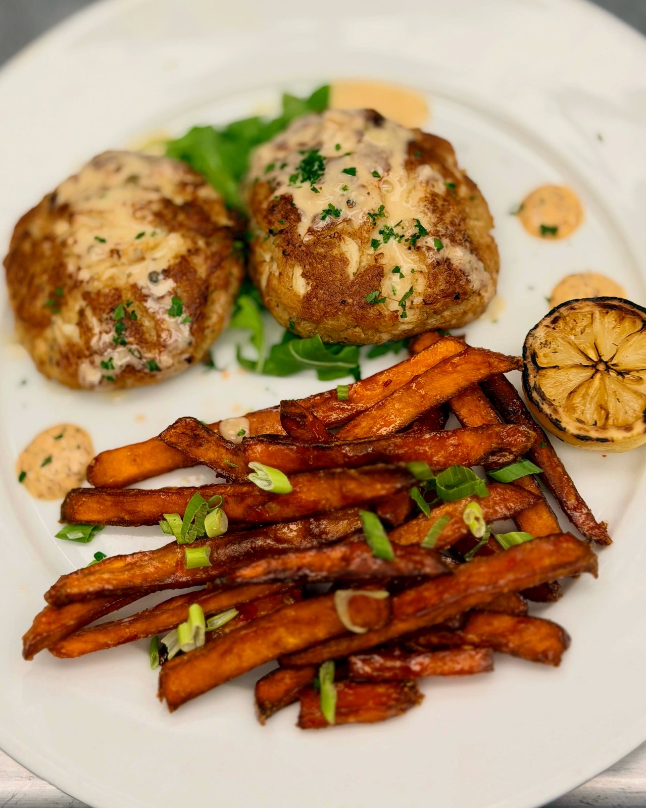Chesapeake crab cakes with sweet potato fries